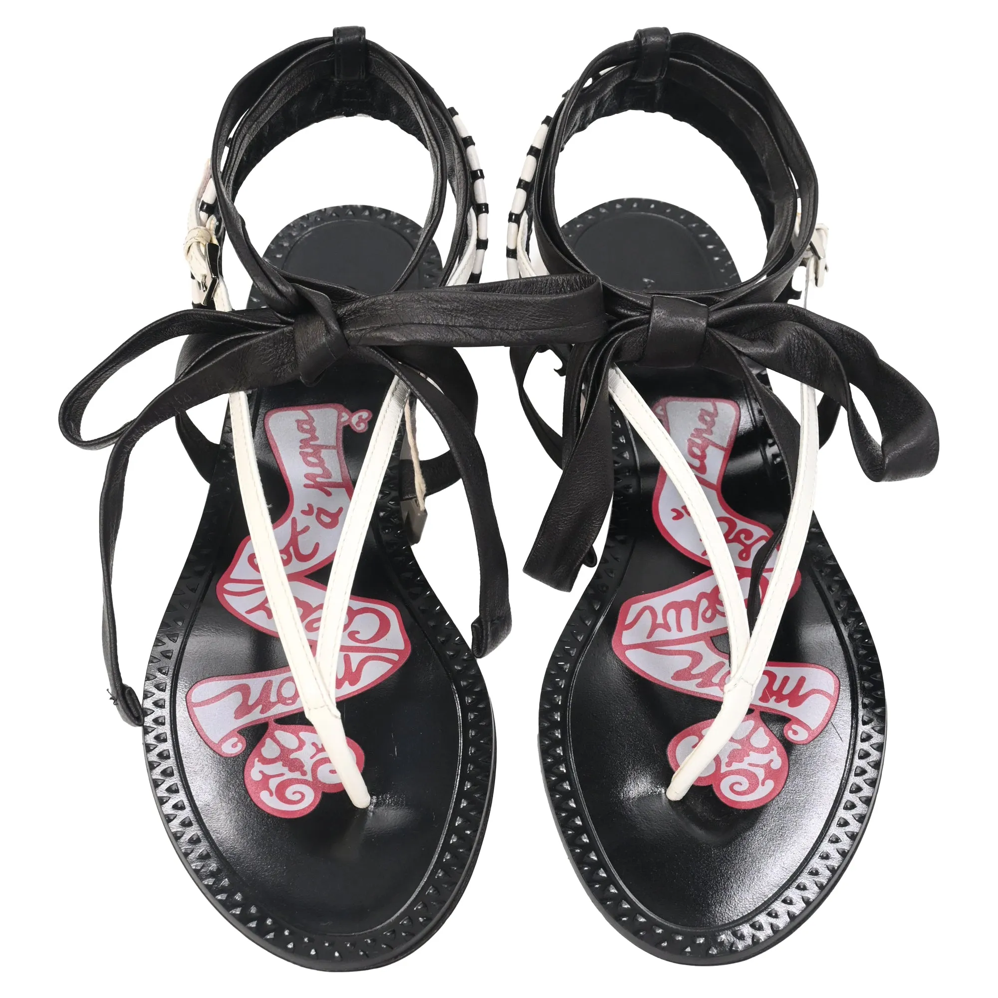 Alaïa Graphic Print Gladiator Sandals in Black Leather
