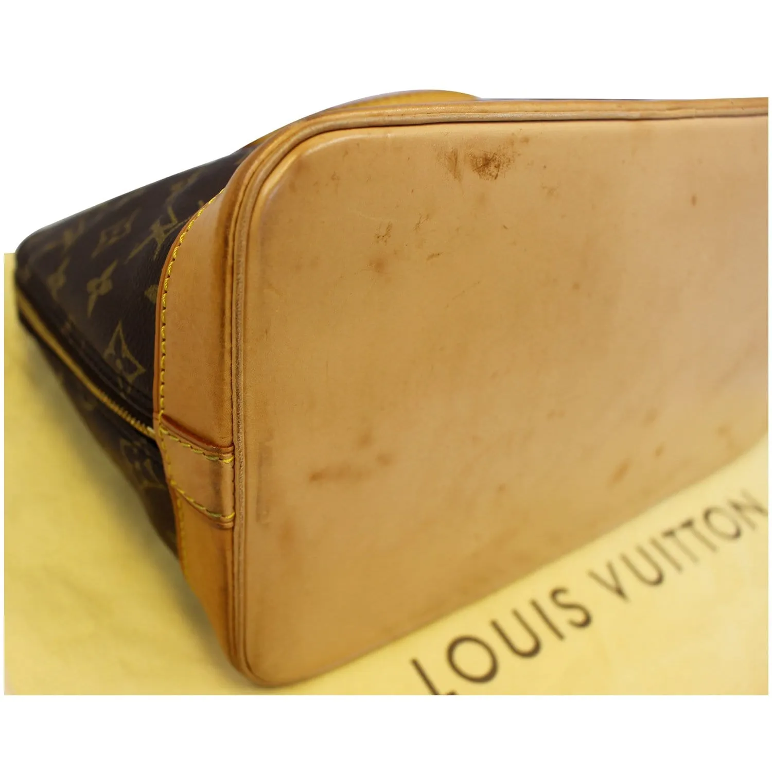 LOUIS VUITTON Alma Monogram Canvas Satchel Bag Brown